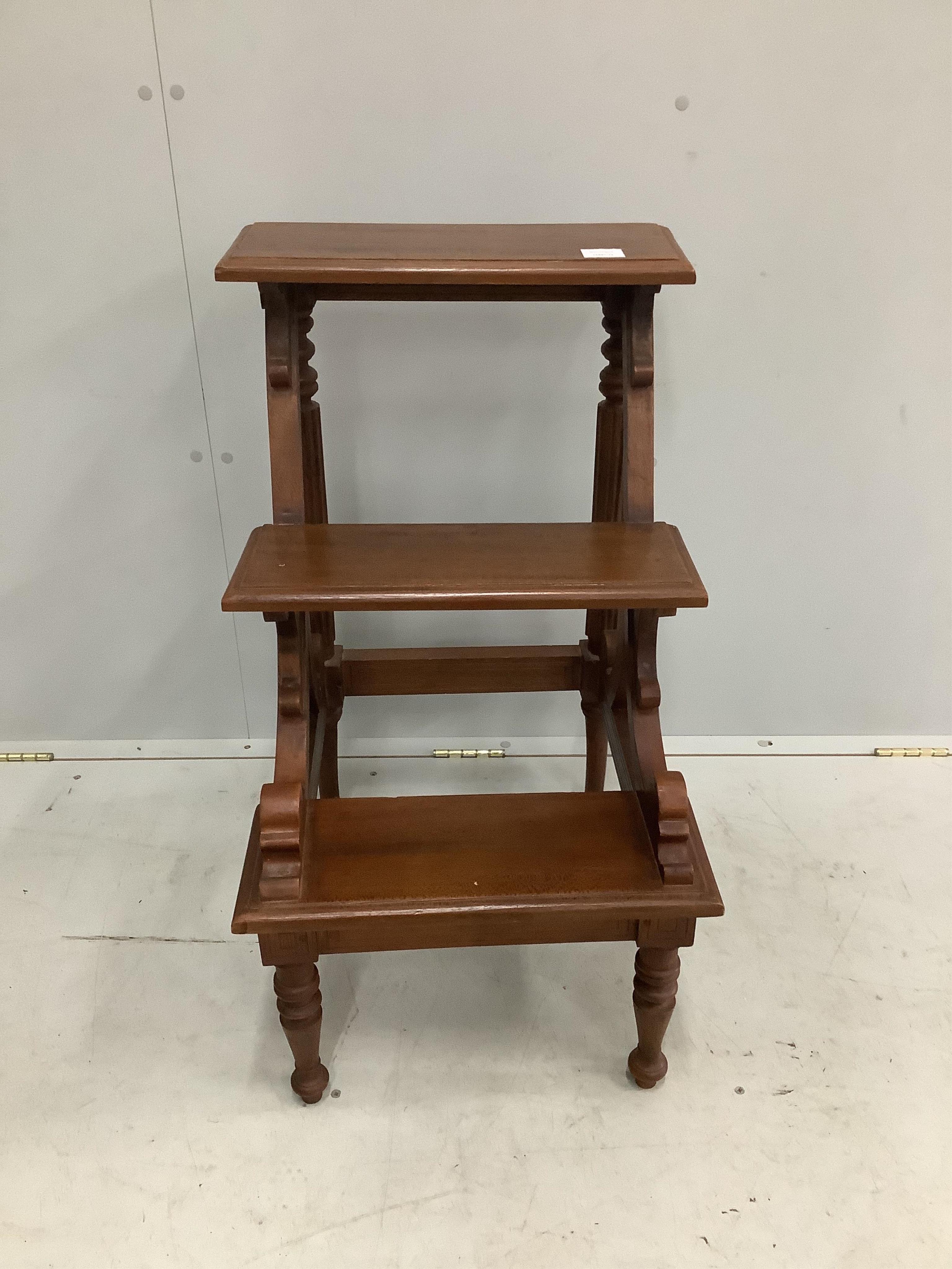 A set of reproduction mahogany three tread library steps, width 46cm, height 82cm. Condition - fair